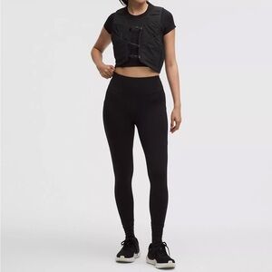 Fast and Free High-Rise Tight 25"
5 Pocket